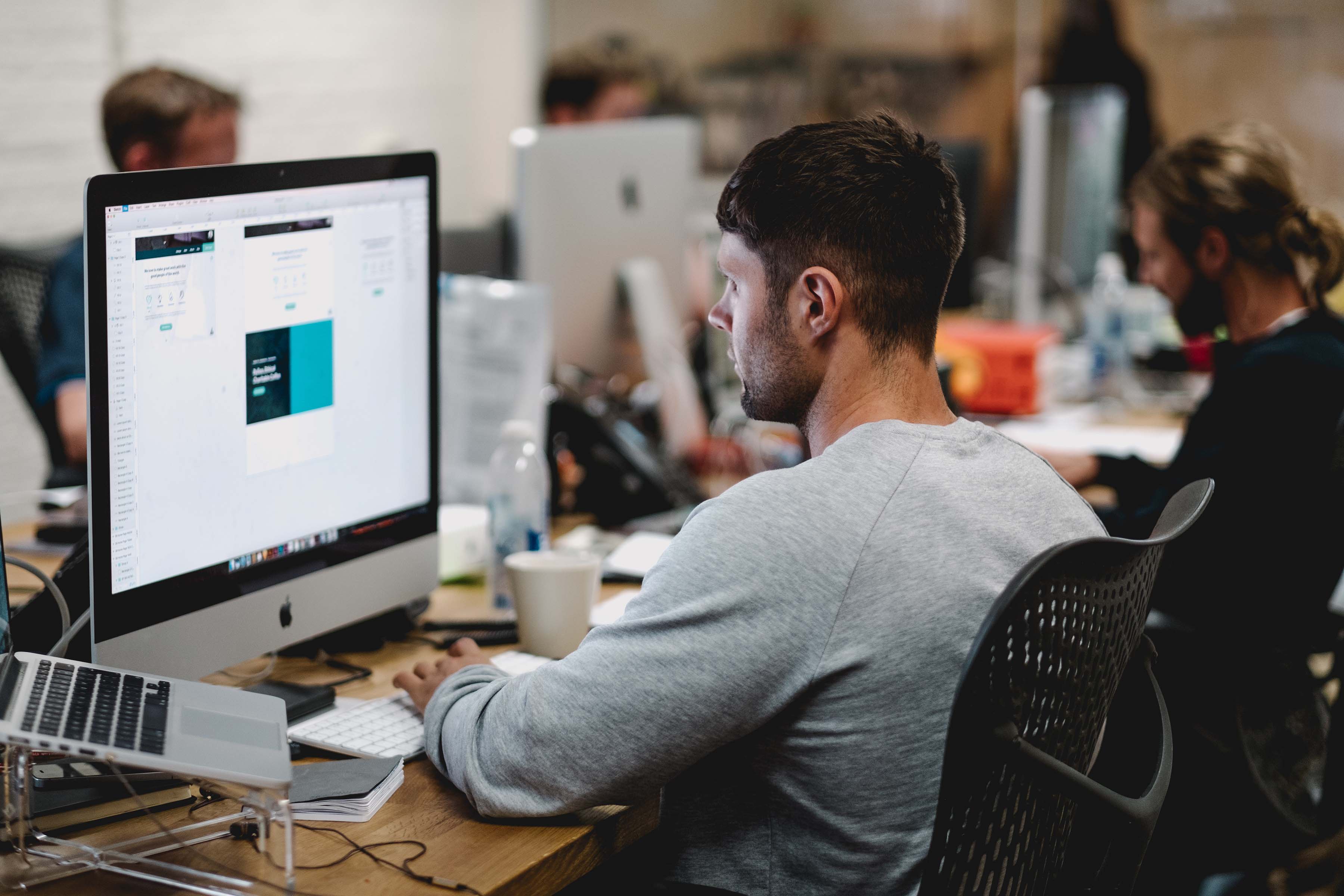 designer using an image optimisation tool to resize an image without loss of quality